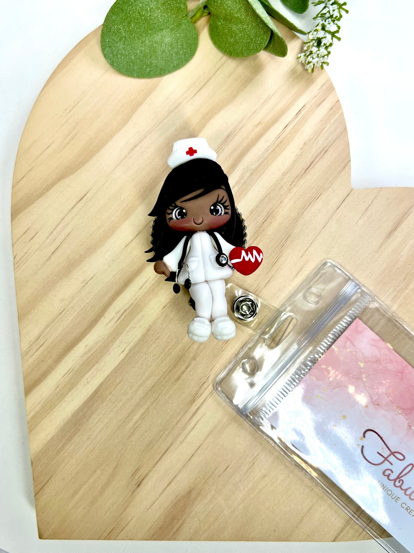 ✨ Badge Reels Decorated, add a touch of charm to your workday with these handmade clay badge reels! Perfect for healthcare heroes, teachers, or anyone who wants to showcase their personality while staying professional. 💕🎨 #HandmadeWithLove #BadgeReels