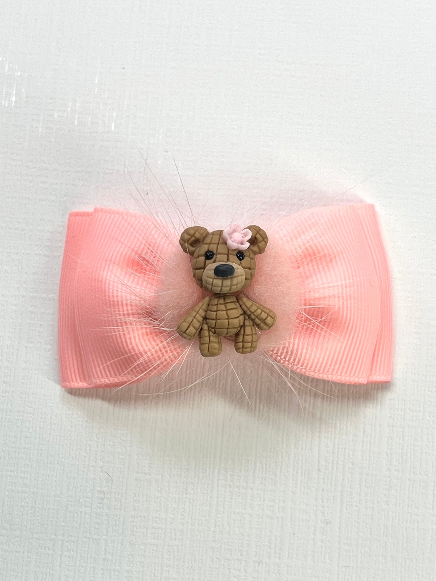 Adorn your Little Cutie with this Adorable Teddy Bear  Girl Hair Clips Bow. Hair clips Bow with a Clay Doll in the center of it.