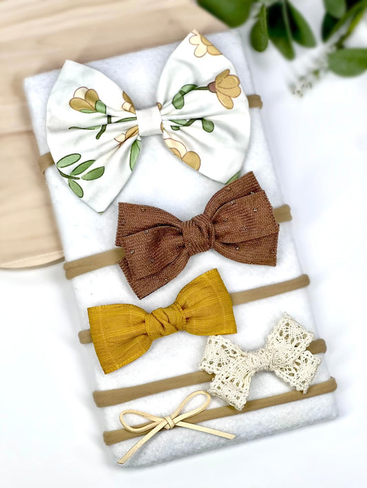 ✨ The sweetest touch for your little one! ✨ Our handmade baby headbands come in a variety of colors and patterns, perfect for any occasion. Set of 5.